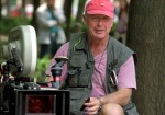Tony Scott, directing in his famous vest and pink hat.